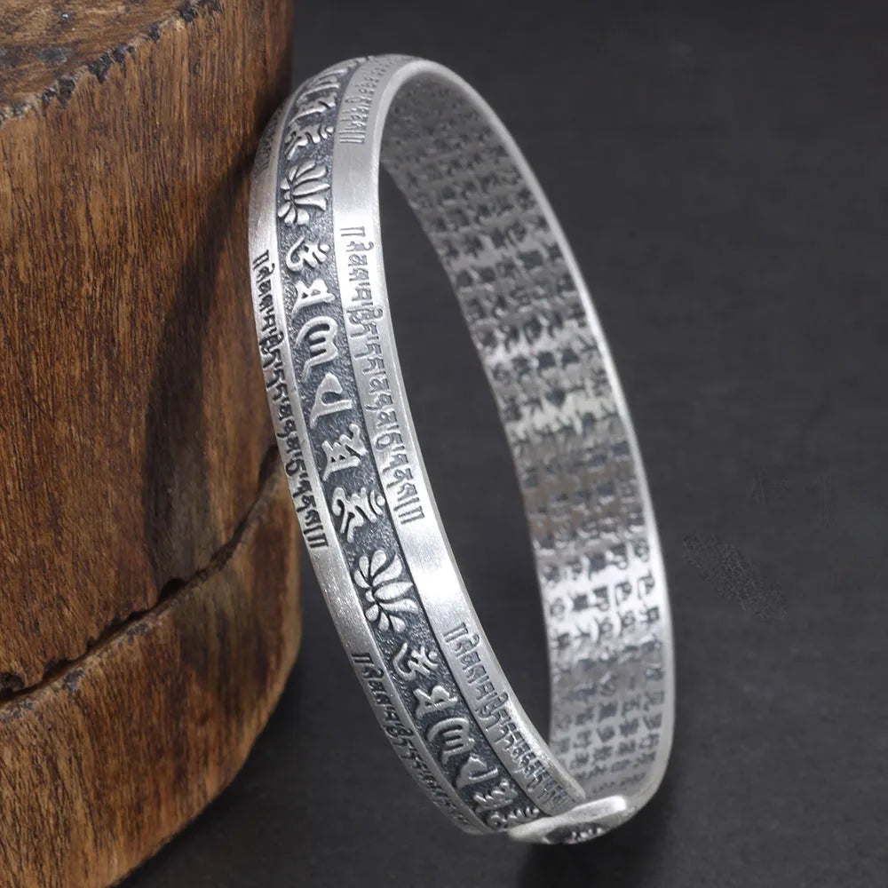 Tibetaanse 'Om Mani Padme Hum' manchetarmband van echt .999 zilver.